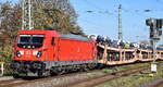 DB Cargo AG, Mainz [D] mit ihrer  187 155  [NVR-Nummer: 91 80 6187 155-7 D-DB] und einem gemischten Güterzug am 06.11.25 Höhe Bahnhof Magdeburg-Neustadt.
