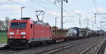DB Cargo AG, Mainz [D] mit ihrer  185 277-1  [NVR-Nummer: 91 80 6185 277-1 D-DB] und ein gemischter Güterzug am 21.04.26 Höhe Bahnhof Rodleben.