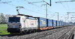 LOKORAIL, a.s., Bratislava [SK] mit ihrer Vectron  383 214-4  [NVR-Nummer: 91 56 6383 214-4 SK-LRL] und einem KLV-Zug am 21.04.26 Höhe Bahnhof Rodleben.