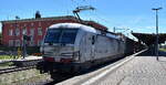 TX Logistik AG, Bad Honnef [D] mit ihrer Vectron  7193 329  [NVR-Nummer: 91 80 7193 329-8 D-TXL] und einem KLV-Zug am 27.05.26 Durchfahrt Bahnhof Dessau Hbf.