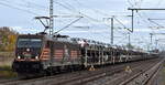 HSL Logistik GmbH, Hamburg [D] mit ihrer  187 535  [NVR-Nummer: 91 80 6187 535-0 D-HSL] und einem PKW-Transportzug (fabrikneue TOYOTA PKW-Modelle) am 04.11.25 Höhe Bahnhof Rodleben.