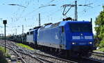 PRESS - Eisenbahn-Bau- and Betriebsgesellschaft Pressnitztalbahn mbH, Jöhstadt [D] mit ihrer  145 030-7  [NVR-Nummer: 91 80 6145 085-7 D-PRESS] und  140 008-6  (NVR:  91 80 6140 845-9 D-PRESS ) + PKW-Transportzug (leer) am Haken am 29.04.26 Höhe Bahnhof Magdeburg-Neustadt