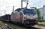 LOKORAIL, a.s., Bratislava [SK] mit der geleasten Rolling Stock Lease s.r.o  Vectron  383 218-5  [NVR-Nummer: 91 56 6383 218-5 SK-RAILL] und einem Pkw-Transportzug am 10.07.26 H�he Bahnhof Magdeburg Neustadt.