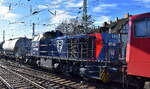 BELog Baustoffe- Entsorgung- Logistik GmbH & Co. KG, Langenau [D] mit ihrer Mak G 1000 BB Lok  271 026-7  [NVR-Nummer: 92 80 1271 026-7 D-MRS] und einem Staubgutwagenzug am Haken von  155 219-9  am 03.03.26 Höhe Bahnhof Magdeburg-Neustadt.