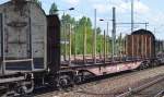 in Drehgestell-Flachwagen mit Niederbindeeinrichtung und Rungen zum Stammholztransport vom Einsteller TRANSWAGGON mit der Nr.
