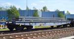 Drehgestell-Flachwagen vom Einsteller ERR mit der Nr.