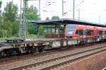 Eine unbeladene Containertragwageneinheit vom Typ Sdggmrss 32, eingestellt mit der Nr.