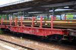 Dregestellflachwagen mit sechs Rads�tzen und Rungen der DB mit der Nr.