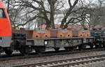 Polnischer Drehgestell-Flachwagen mit Lademulden für Coils der PKP Cargo mit der Nr.