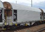 Schwedischer Drehgestell-Flachwagen mit Schiebeplane für Coiltransporte vom Einsteller AAE Cargo mit der Nr.