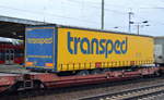 Ein Trailer des österreichischen Transportunternehmens transped auf einem Taschenwagen am 01.03.17 Bf.