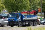 Ein IVECO TRAKKER 450 EEV Baukipper (Selbstlader) der Fa.