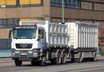 MAN TGS 18.440 hochwandiger Kipper + Abrollkipph�nger, 03.03.11 Berlin-Putlitzbr�cke.