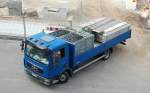 MAN TGL 8.180 LKW mit Ladefl�che mit Pritschenumrandung einer Ger�stbaufirma, 22.08.13 Berlin-Pankow.
