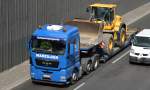 Ein MAN TGX 26.480 mit Tiefladebrücke (Schwertransport)der Fa.