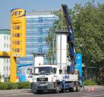 MAN Pritschenaufbau-LKW mit Hydraulikgreifarm der Fa.