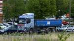 Ein MB New ACTROS Abrollkipper der Fa.