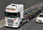 SCANIA R 450 ZUgamschine mit Flachauflieger mit Stahlstangen beladen der Fa.