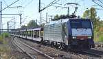 PKP Cargo it MRCE Dispolok E 189 844 und einem leeren PKW-Transportzug am 02.10.15 Durchfahrt Bhf.