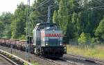 Eine von den beiden STRABAG RAIL Loks der BR 203 mit einigen Drehgestell-Flachwagen mit Betonschwellen aus Richtung Oranienburg kommend Richtung Karower Kreuz Berlin, 18.07.13 M�hlenbeck/M�nchm�hle