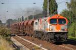 Ex OHE Tiger, jetzt hvle Orange Tiger V330.7 (250 005-6) hat einen Ganzzug Sch�ttgutwagen vom Baustoffhandel N�he Sch�nerlinde abgeholt und f�hrt nun auf dem Hauptgleis Richtung karower Kreuz Berlin,