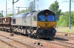 Noch mal eine Nahaufnahme der HHPI 29006 (92 80 1266 028-0 D-BRLL) mit Schotterzug am 30.05.11 Bhf.