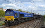 HHPI 29004  Dave Meehan  266 027-2 mit dem blauen SChüütgutförderzug beim Verlassen der Industrieübergabe Nordost am 24.04.17 Berlin-Hohenschönhausen.