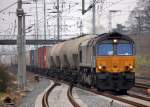 Damalige DLC PB 15 (GM-EMD, Bj.2002) mit gemischtem G�terzug bei der Durchfahrt im Bhf.