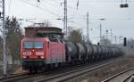 RHB 134/143 173-3 (noch eine neue in der RBH-Flotte) mit einem Zug Heizoelkesselwagen (leer) Richtung Schwedt, 18.02.15 Berlin-Karow.