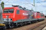 MEG 706 (155 119-1) mit MEG 804 (156 004-4) und Zementstaubzugwagen (leer) am Haken am 08.09.15 Bhf.