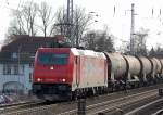 HGK 2051/185 582-4 (91 80 6185 582-4 D-HGK) mit einem Kesselwagenzug mit lt.