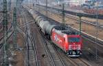 HGK Lok 2051/185 582-4 mit Kesselwagenzug Richtung Nordosten, 13.02.13 Berlin Putlitzbr�cke.