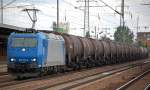 ATC Mietlok von HGK 185 521-2 mit Kesselwagenzug (Benzol) bei der Durchfahrt im Bhf.