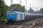 ATC Mietloks 185 523-8 und am Haken 2015/145-CL 201 von HGK mit Kesselwagenzug Richtung Schwedt, 04.10.13 Berlin-Karow.