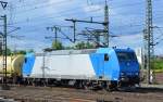 ATC Mietlok 185 518-8 für CFL Cargo tätig mit einem Warsteiner Bierbrauerei Containerzug bei der Durchfahrt im Bhf.