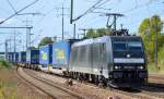BoxXpres mit MRCE Mietlok 185 563-4 und KLV-Zug (LKW-WALTER) bei der Durchfahrt Bhf.