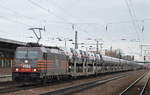 HSL 185 599-8 [NVR-Number: 91 80 6185 599-8 D-BRLL, Bombardier Bj.2008] mit einem PKW- Transportzug mit fabrikneuen TOYOTA PROACE Transportern am 07.03.17 Durchfahrt Bf.
