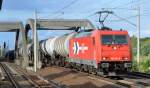 ATC Mietlok RHC 2066/185 631-9 mit Kesselwagenzug am 19.06.14 Berlin-Pankow.