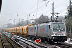 Die polnische LOTOS mit ihren beiden Railpool-Loks E 186 146-7 + 186 276-2 mit einem langen Ganzzug noch ganz neuer Drehgestell-Schüttgutwagen mit Schwenkdach und dosierbarer Schwerkraftentladung