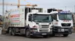 Inzwischen in enger Kooperation in Berlin tätig die Firmen REMONDIS/Berlin Recycling mit eigenen Müllentsorgungsfahrzeugen, im Vordergrund ein SCANIA P 320 und daneben ein MAN TGS am
