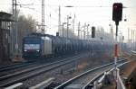 MRCE Dispolok in Diensten von CTL, ES 64 U4-207 (91 80 6189 207-4 D-DISPO) mit Ganzzug Kesselwagen (Dieselbef�llung) aus Richtung Oranienburg kommend Richtung Schwedt unterwegs, 17.01.11 Karower Kreuz
