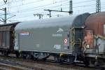 Drehgestell-Flachwagen mit Schiebeplane zum Transport von Stahlcoils vom Einsteller NACCO vermietet am ArcelorMittal eingestellt in den Niederlanden mit der Nr.