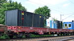 Drehgestell-Flachwagen mit Seitenborden vom Einsteller ERMEWA mit der Nr.