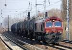 HGK DE 62 (92 80 1266 062-9 D-HGK, GM-EMD Bj.1999) am 30.03.11 mit Kesselwagenzug Berlin-Karow.