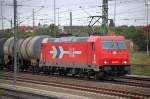 HGK 2065/185 630-1 (91 80 6185 630-1 D-HGK) mit Kesselwagenganzzug Richtung Berlin-Spandau, 28.09.10 Berlin-Beusselsstr.