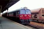 Die einzige Lok ihres Typs in Deutschland ist die HHPI 259003 (Typ JT26CW-SS, GM-EMD Bj.1985) einem Vorl�ufer der Claas 66 hier am 24.04.07 mit Schotterzug im Bhf.