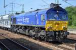 HHPI 29001 (266 461-3) mit einem typischen Ganzzug Schüttgutwagen am 18.07.15 Bhf.