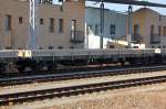 Drehgestellflachwagen mit vier Rads�tzen und Stirn- und Seitenwandklappen der HVLE eingestellt mit der Nr.