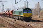 Ascendos Leasinglok von ITL PB18 (92 80 1266 22-3 D-ITL, GM-EMD Bj.2002) mit Ganzzug offener Sch�ttgutwagen, 28.03.12 Bhf.