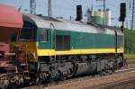 Ascendos Mietlok der ITL 29002 (92 80 1266 006-6 D-ITL) mit Ganzzug Sch�ttgutwagen bei einer Kurzpause Bhf.